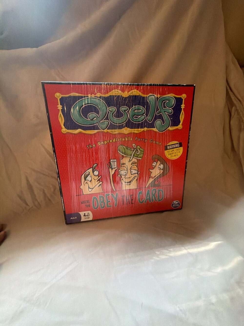 Quelf The Unpredictable Party Board Game by Spin Master